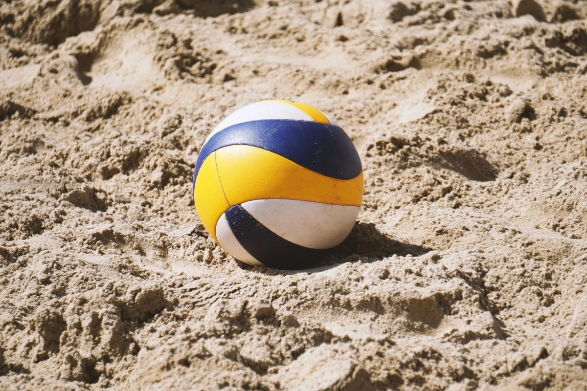 Playing volleyball on the beach