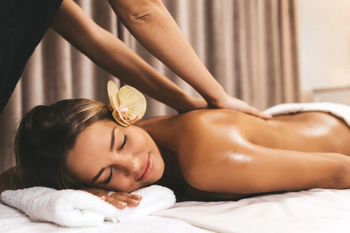 Woman receiving a delightful massage at kaab spa